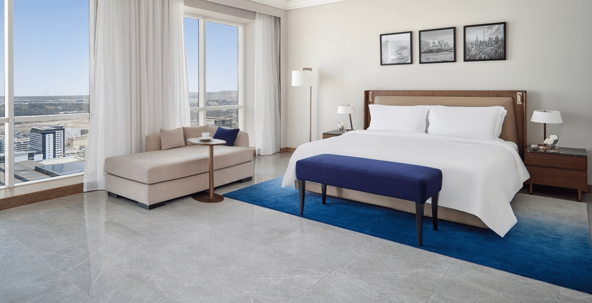 Well-arranged bedroom furniture showcasing a harmonious layout, with stylish and functional pieces that maximize space and enhance the room