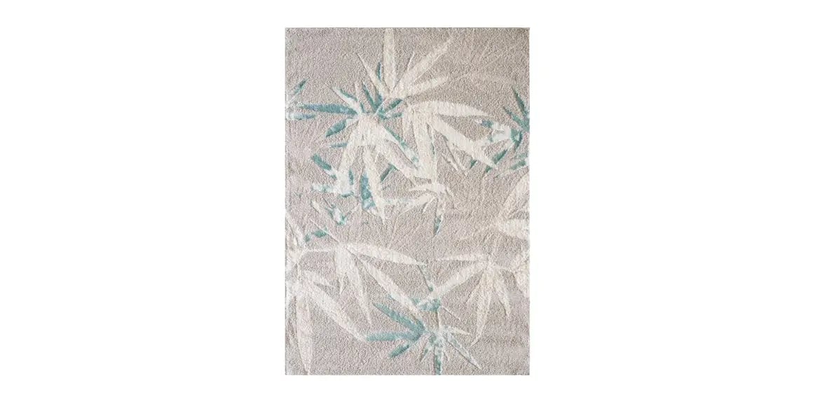 Beige rug with bamboo leaf pattern in white and teal – nature-inspired custom carpet for modern living rooms by BOLD UAE.