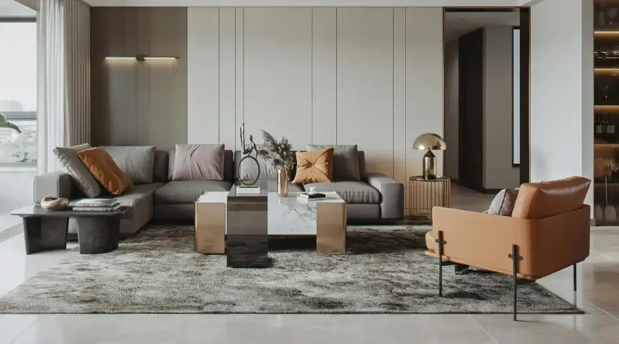 Sophisticated living room with a modern sofa, marble coffee table, and warm accents, blending luxury and contemporary design.