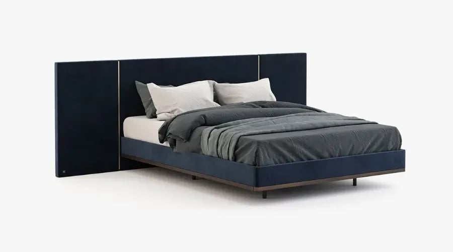Luxury custom bed with a wide, dark upholstered headboard and sleek frame, featuring elegant bedding and contemporary style.