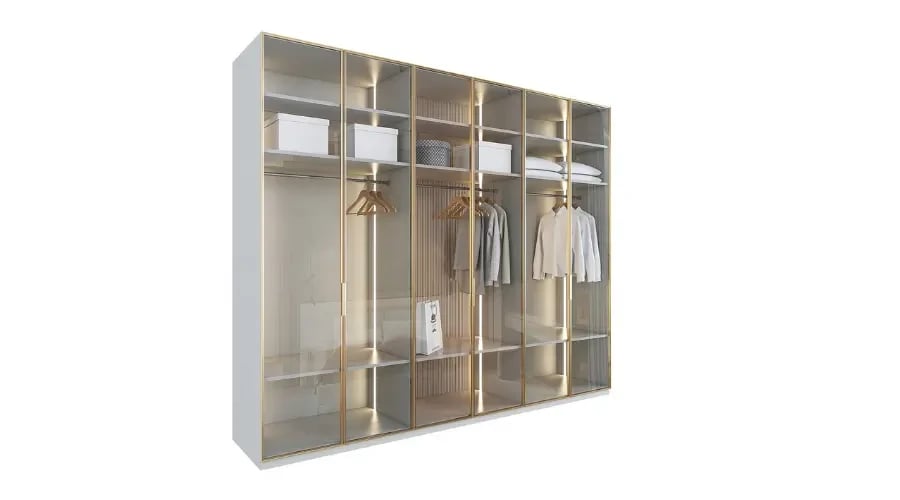 Luxury open wardrobe with glass doors, gold trim, and integrated lighting, featuring multiple shelves and hanging space for a modern bedroom.