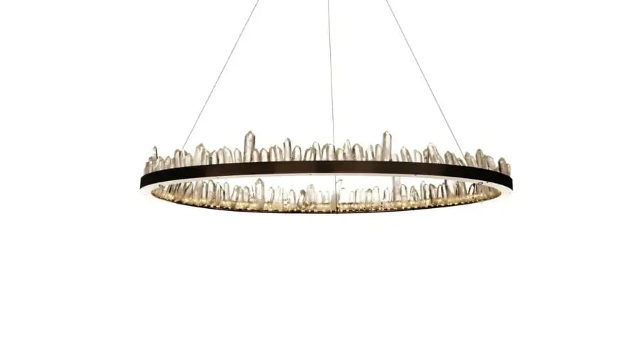 Modern circular chandelier with crystal-like edge detailing and ambient LED lighting for luxury interiors