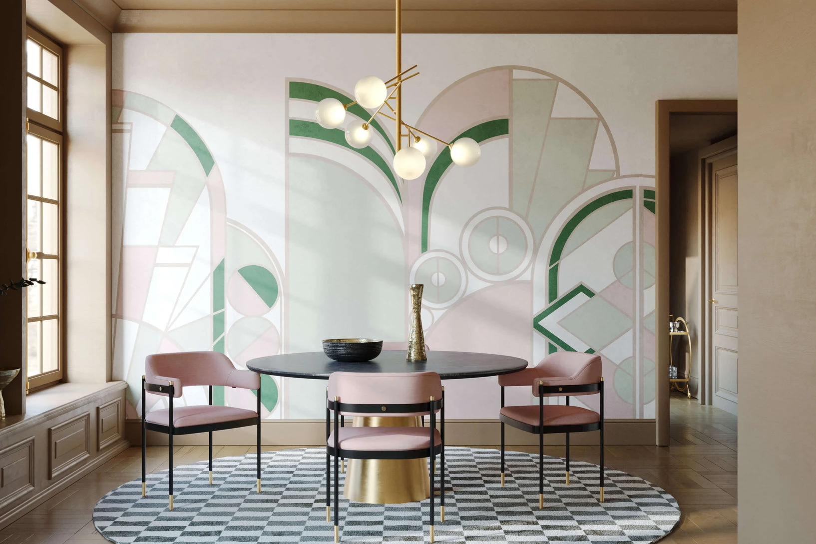 Modern dining room with an abstract geometric wallpaper design in pastel green and pink tones, featuring a round black table, pink chairs, and a stylish gold chandelier.