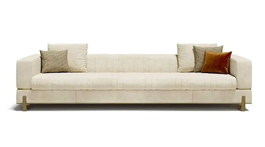 Elegant cream-colored modern sofa with plush cushions and a streamlined design, offering both comfort and style.