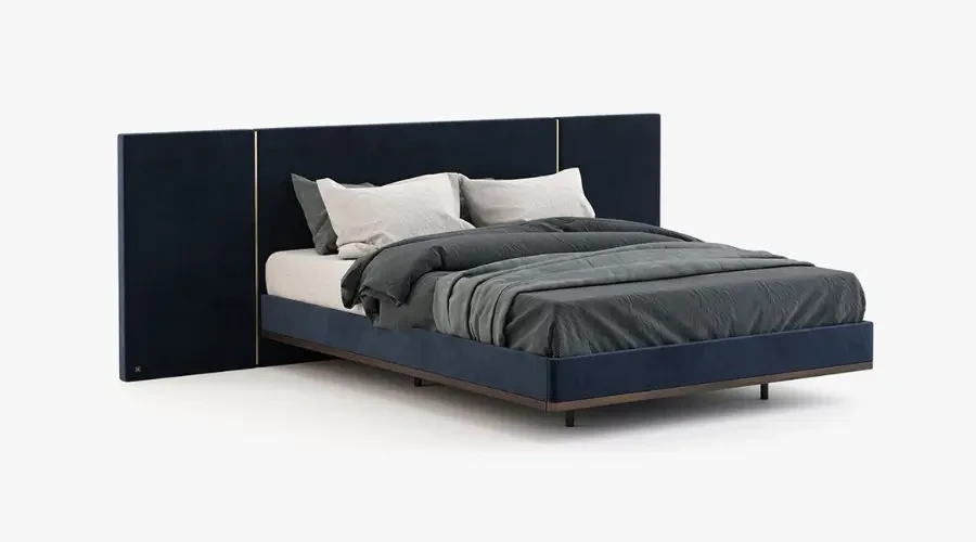 Luxury custom bed with a wide, dark upholstered headboard and sleek frame, featuring elegant bedding and contemporary style.