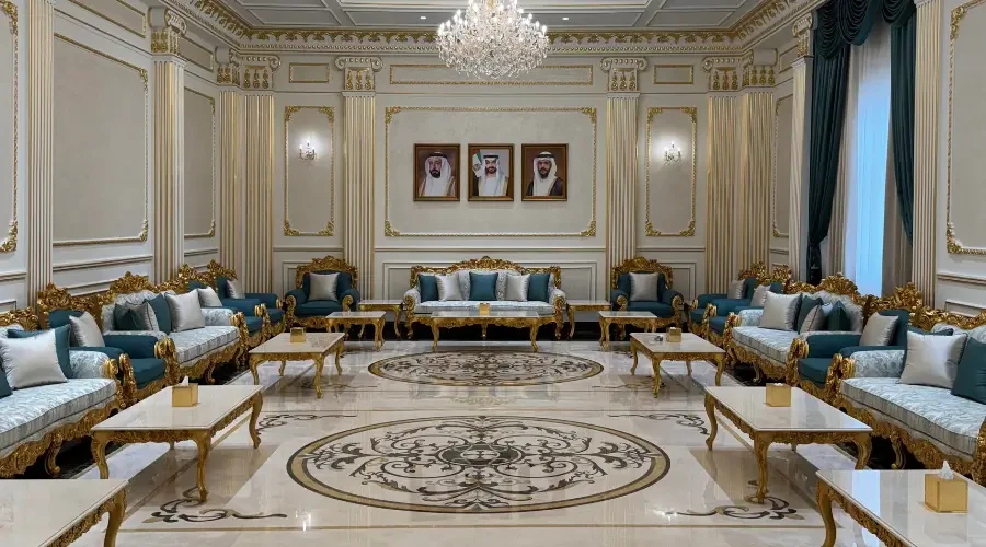 Classic majlis design with gold furniture and marble flooring in a luxury UAE interior