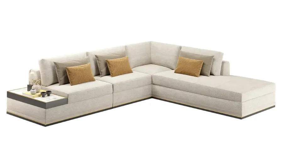 Modern L-shaped modular sofa with built-in side table and neutral upholstery for luxury majlis or living room design
