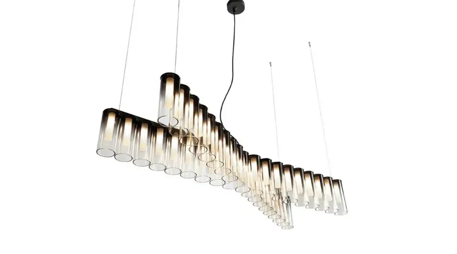 Contemporary pendant chandelier with staggered glass tubes and soft lighting for modern interior design